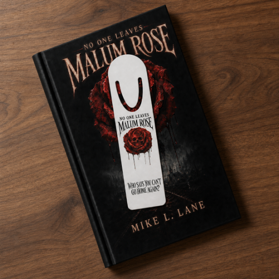 Fake Malum Rose book with a U-shaped metal bookmark placed on top of it, with the matching book cover design. This image used a walnut tabletop background.