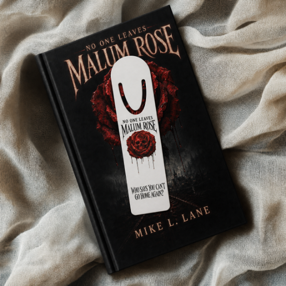 Fake Malum Rose book with a U-shaped metal bookmark placed on top of it, with the matching book cover design.
